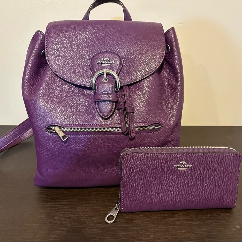Coach backpack purse and matching wallet.